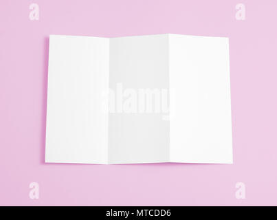 Blank folding page booklet on pink background Stock Photo