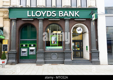 Cardiff, Wales, UK, May 27, 2018: Lloyds bank advertising sign outside the entrance to their retail branch in Cardiff High Street Stock Photo