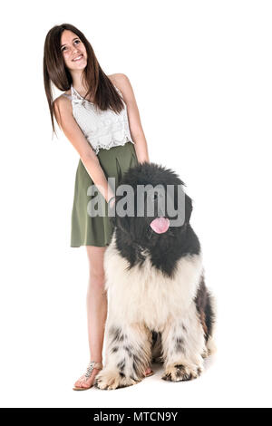 newfoundland dog and woman in front of white background Stock Photo