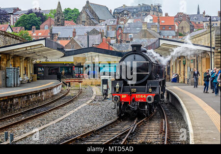 Steam locomotive LNER 1264 pulling out of Whitby station with full head of steam taken in Whitby, Yorkshire, UK on 22 May 2018 Stock Photo