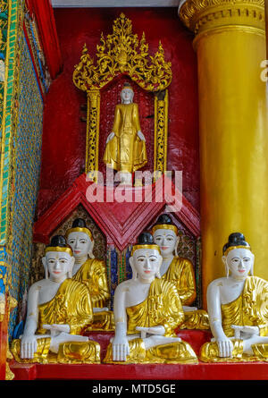 Buddha statues at Main Hall of Shwedagon Pagoda in Yangon, Myanmar. Stock Photo