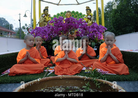 Kuala Lumpur, Kuala Lumpur, Malaysia. 29th May, 2018. Young monks take part in procession during Vesak day celebration in Kuala Lumpur. Vesak, or Visakha (pronounced way-sak), is a celebration that commemorates the Buddha's birth, enlightenment, and death, and his passing into nirvana. Credit: Kepy/ZUMA Wire/Alamy Live News Stock Photo