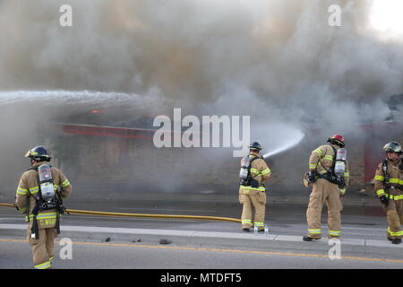 London Ontario, Canada. May 29th 2018, London, Ontario Canada, Fire broke out at the old Hooks restaurant around 5:15pm today at the corner of Southdale and Wharncliffe in London Ontario,  Fire crews were battling the flames for hours and had the blaze tame round 8 pm.  Even though the restaurant has not been open years, Londoners still have great memories and are sad to let this building go. Luke Durda/alamy Live news. Stock Photo