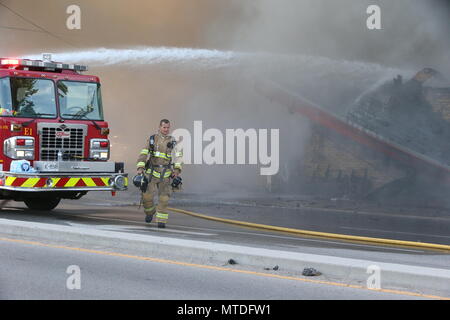 London Ontario, Canada. May 29th 2018, London, Ontario Canada, Fire broke out at the old Hooks restaurant around 5:15pm today at the corner of Southdale and Wharncliffe in London Ontario,  Fire crews were battling the flames for hours and had the blaze tame round 8 pm.  Even though the restaurant has not been open years, Londoners still have great memories and are sad to let this building go. Luke Durda/alamy Live news. Stock Photo