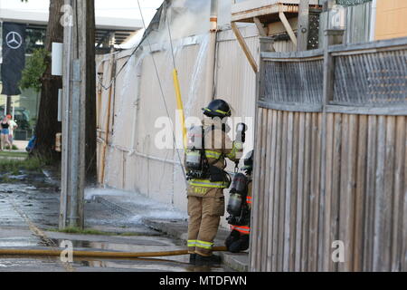 London Ontario, Canada. May 29th 2018, London, Ontario Canada, Fire broke out at the old Hooks restaurant around 5:15pm today at the corner of Southdale and Wharncliffe in London Ontario,  Fire crews were battling the flames for hours and had the blaze tame round 8 pm.  Even though the restaurant has not been open years, Londoners still have great memories and are sad to let this building go. Luke Durda/alamy Live news. Stock Photo