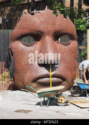 Canterbury, Kent, UK. 30th May 2018. UK Weather: a hot, humid and sunny afternoon in the city of Canterbury, Kent. The Bulkhead face sculpture / statue outside the Marlowe Theatre. Credit: James Bell/Alamy Live News Stock Photo