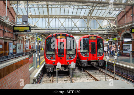 Two London Underground Tube Trains side by side at a platform in London ...