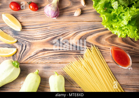 Food background Uncooked Pasta Macaroni Spaghetti Cappellini Stock Photo