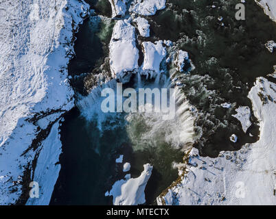 Aerial view, Góðafoss waterfall from above, Godafoss in winter with snow and ice, Norðurland vestra, Northern Iceland Stock Photo