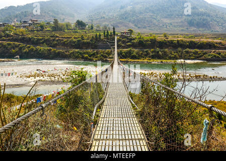 Longest suspension bridge of Bhutan over river Puna Tsang Chhu, Punakha, Bhutan Stock Photo