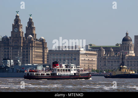 The Mersey Ferry Royal Iris sailing past the Liver Buildings on the River Mersey in Liverpool UK. Stock Photo