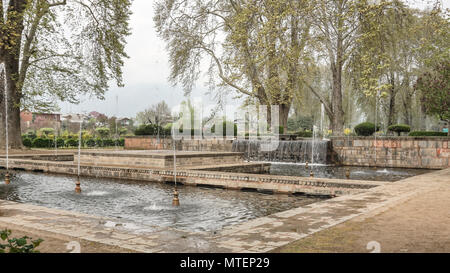 This Image is of a huge garden in Kashmir, India, In total there are more than 200 water fountains in this beautiful Garden for which this is famous. Stock Photo