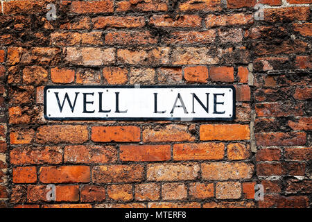 Well Lane street sign on brick wall in Lincoln, East Midlands, UK taken on 23 May 2018 Stock Photo
