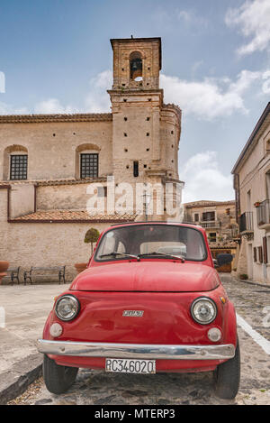 Vintage Fiat 500, Chiesa del Sacro Cuore di Gesu, 18th century church, in Gerace, Calabria, Italy Stock Photo
