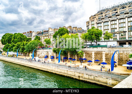 The Paris Plages are temporary artificial beaches each summer along the river Seine in the centre of Paris Stock Photo