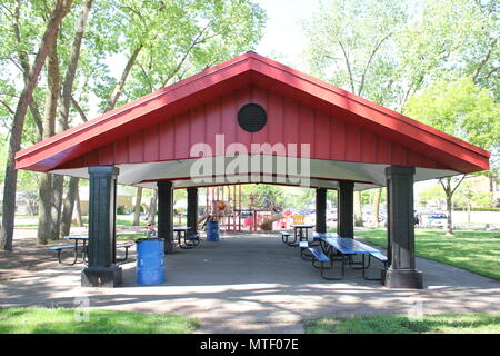 Eating shed in Golf Mill Park playground in small-town Niles, Illinois on a hot sunny summer day. Stock Photo