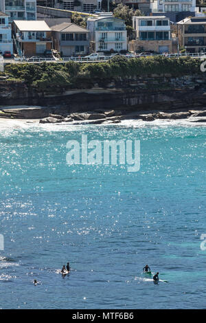 Swimming and surfing at Bronte beach in Sydney, NSW, Australia Stock Photo