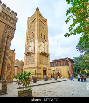 CAIRO, EGYPT - DECEMBER 24, 2017: The beautiful stone Moroccan minaret of the mosque of Manial Palace, famous for its unusual architecture, on Decembe Stock Photo