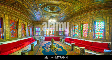 CAIRO, EGYPT - DECEMBER 24, 2017: Panorama of the Syrian hall in Reception Palace of Manial complex with ornate decorations of walls and ceiling and t Stock Photo