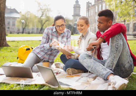 Participants of exchange program studying together Stock Photo