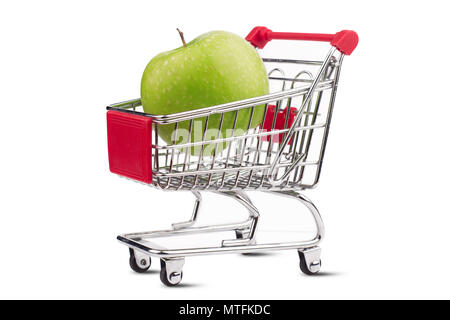 top view closeup of shiny aluminum empty miniature shopping supermarket cart with one green apple inside isolated on white background Stock Photo