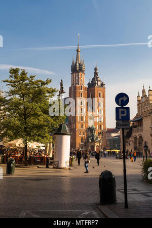KRAKOW, POLAND - OCTOBER 30: Market Square and St. Mary's Church in Krakow on 30 oktober 2015. Poland Stock Photo