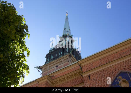 The steeple of Storkyrkan, officially named Sankt Nikolai kyrka (Church of St. Nicholas) and informally called Stockholms domkyrka,Stockholm Cathedral Stock Photo