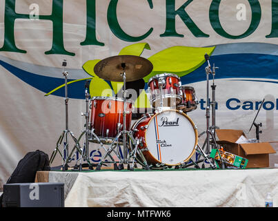 HICKORY, NC, USA-27 MAY 18: A set of drums sets idle on a stage, waiting for the music to start. Stock Photo