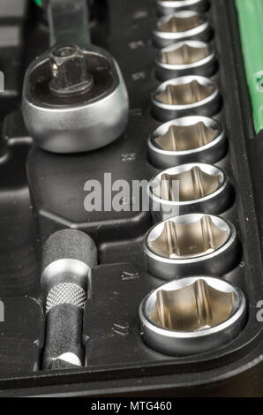 Assorted ratchet sockets inside a toolbox Stock Photo