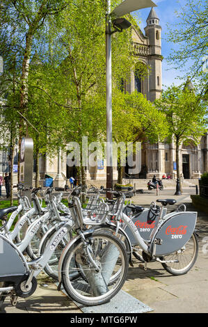 Belfast Bikes in Cathedral Quarter, Belfast. St. Anne's Cathedral is in the background
