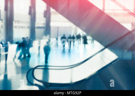 Blurred photo of escalators in modern building Toned background Stock Photo