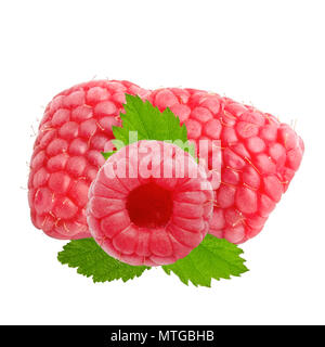 Isolated berries. Three raspberry fruits with leaves isolated on white background with clipping path as package design element and advertising. Stock Photo