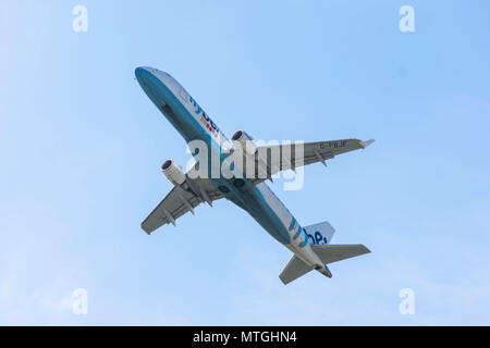 Flybe Embraer 175 Shooting Out of Manchester Stock Photo