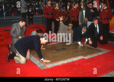 HOLLLYWOOD, CA - JUNE 12: (L-R) Actors Walter Koenig, Leonard Nimoy, George Takei, Nichelle Nichols, James Doohan DeForest Kelley and William Shater attend The Cast of 'Star Trek' Hand and Footprint Ceremony on June 12, 1991 at Mann's Chinese Theatre in Holllywood, California. Photo by Barry King/Alamy Stock Photo Stock Photo