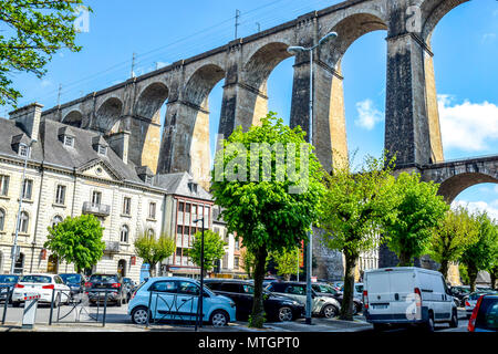 The 1800s viaduct in Morlaix, Brittany, France looms over the town below. Stock Photo