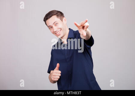 Cool positive guy showing peace sign Stock Photo