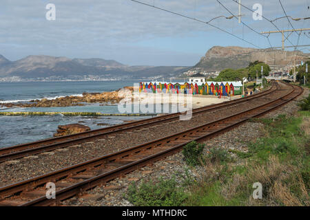 Railway tracks and beach huts on Glencairn beach, simondstown, garden route, south africa Stock Photo