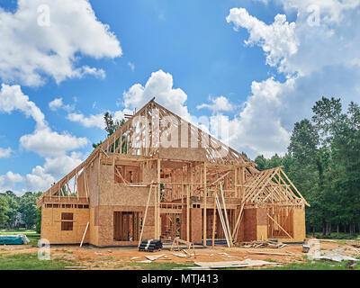 Exterior of framed residential house under construction in a subdivision in Montgomery Alabama, USA. Stock Photo