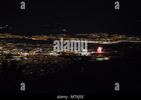 Scenic view over Albuquerque, New Mexico at night during a firework show. Stock Photo