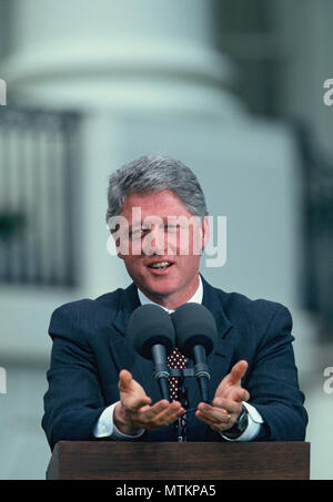 President Bill Clinton makes a statement on the South Lawn of the White House.  Photograph by Dennis Brack Stock Photo