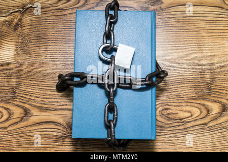 Information security concept, book with chain and padlock Stock Photo