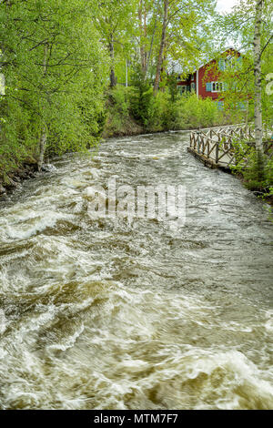 The Rapids at Renforsen in Vindeln, Sweden with old mill. Stock Photo
