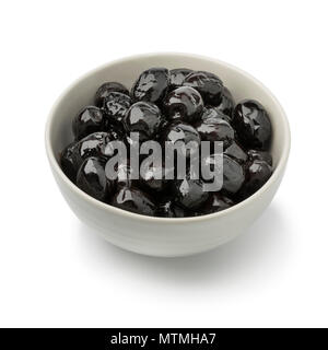 Bowl with shiny black olives as a snack isolated on white background Stock Photo