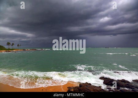 sea stormy landscape over rocky coastline Stock Photo