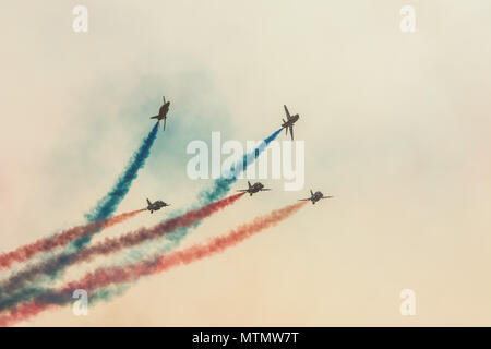 Airplanes doing stunts at an airshow. Stock Photo