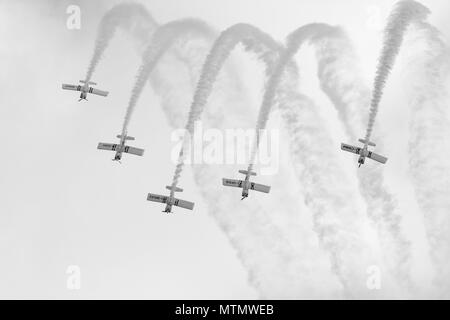 Airplanes doing stunts at an airshow. Stock Photo