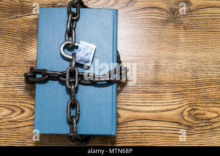 Information security concept, book with chain and padlock Stock Photo
