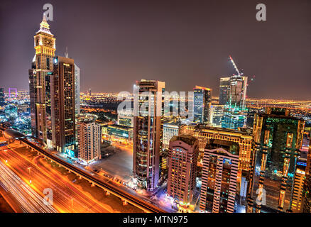 Dubai night panoramic view of Sheikh Zayed road. Dubai is super modern city of UAE, cosmopolitan megalopolis. Stock Photo