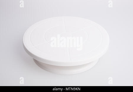 cake stand or rotating cake stand on a background Stock Photo