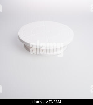 cake stand or rotating cake stand on a background Stock Photo